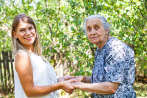 two women in a garden