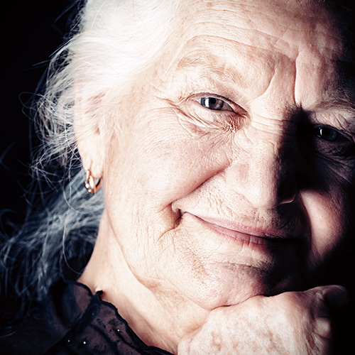 close up image of contented older woman