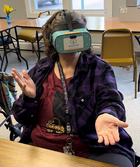 Older woman at a local council on aging enjoying a virtual reality experience
